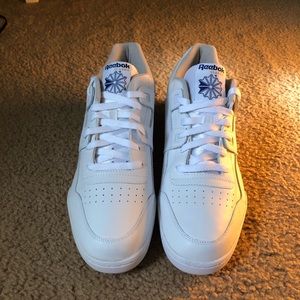 White Reebok Workout Plus Sneakers